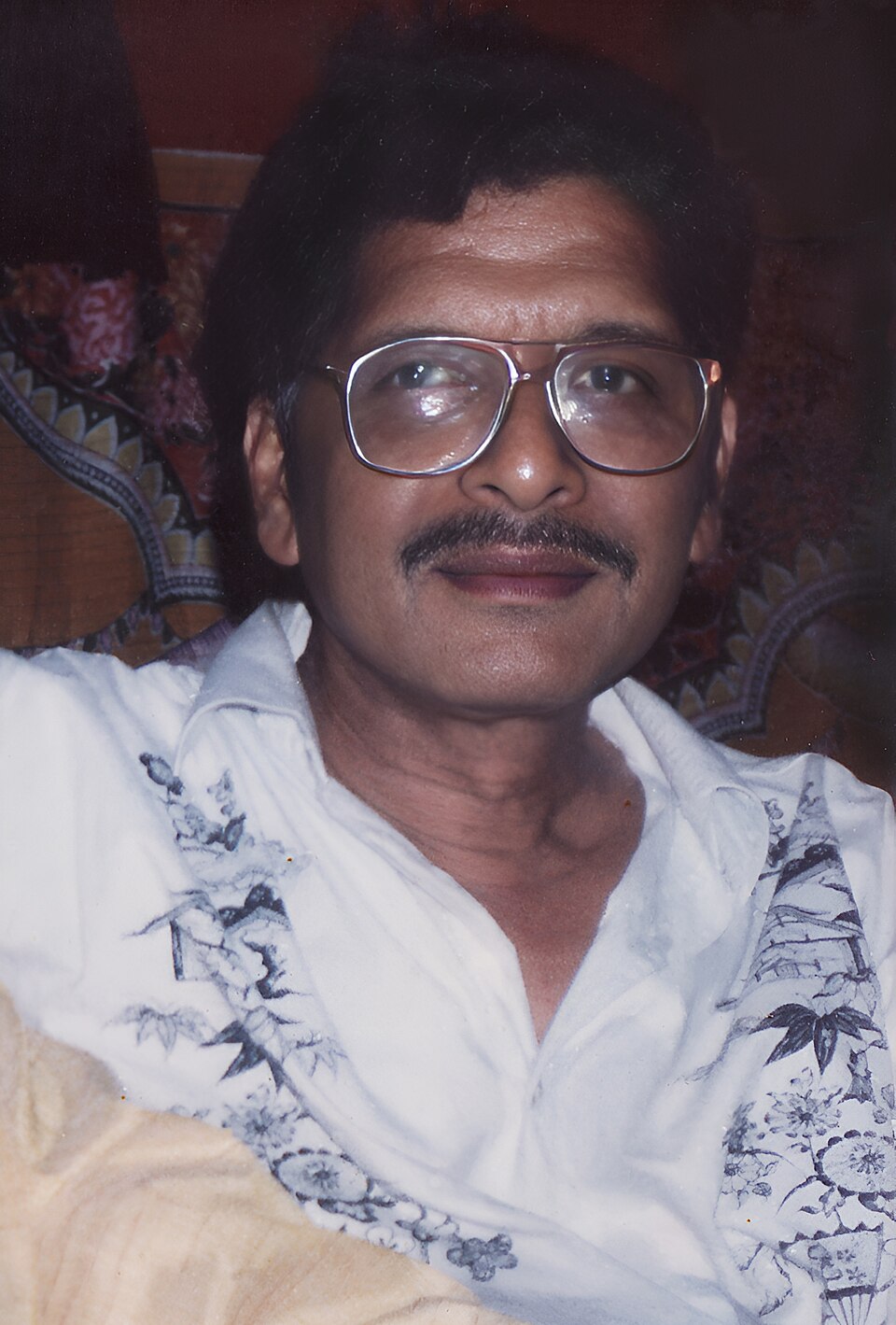 Restored image of Akshaya Mohanty, original by Krupasindhu Muduli (CC-BY-SA-3.0) and restored by Subhashish Panigrahi. The original image was first resized, and the face was restored using the open-source generative AI t